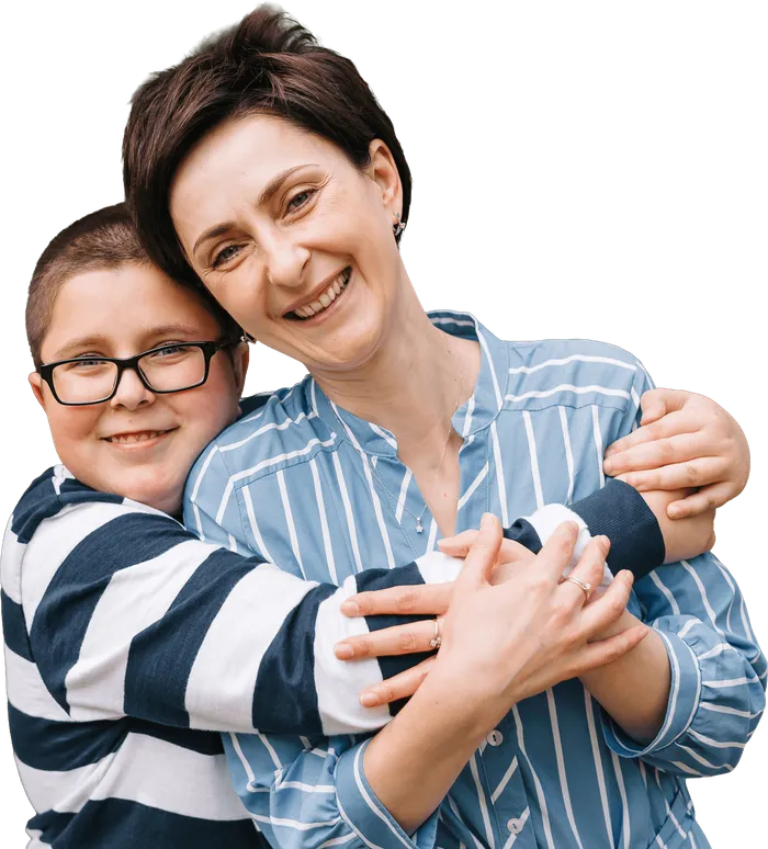 A mum hugging her son